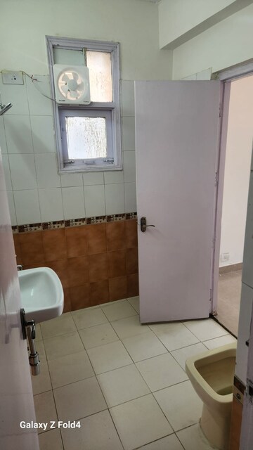 Bathroom in 2 BHK Apartment at Parsvnath Majestic Floors, Vaibhav Khand – for Rent
