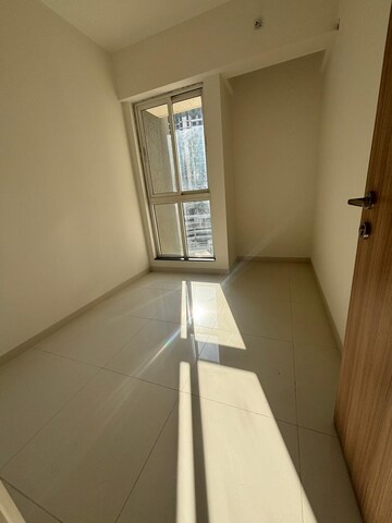 Room in 1.5 BHK Apartment at Godrej Emerald, Ghodbunder Road – for Sale
