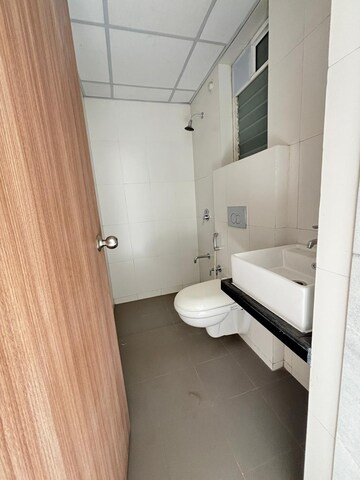 Bathroom in 1.5 BHK Apartment at Godrej Emerald, Ghodbunder Road – for Sale
