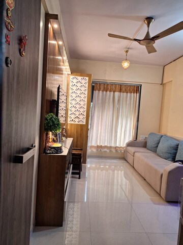 Living Room in 1 BHK Apartment at Squarefeet Joy square, Kasarvadavali – for Sale