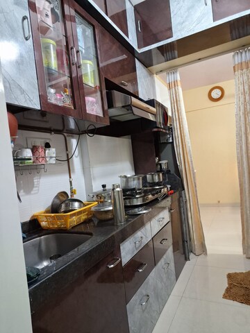 Kitchen in 1 BHK Apartment at Squarefeet Joy square, Kasarvadavali – for Sale