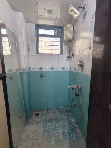 Bathroom in 1 BHK Apartment at Evershine CHS Malad, Malad West – for Rent