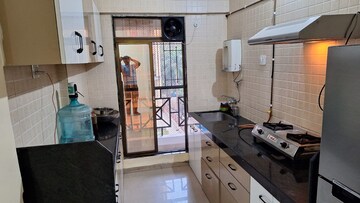 Kitchen in 2 BHK Apartment at Varsha Balaji Residency, Kharghar – for Rent