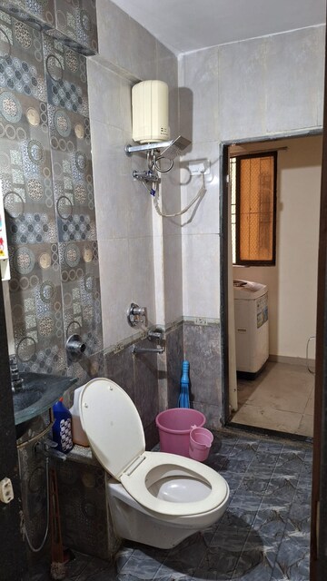 Bathroom in 2 BHK Apartment at Varsha Balaji Residency, Kharghar – for Rent