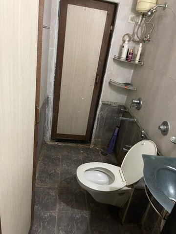 Bathroom in 2 BHK Apartment at Varsha Balaji Residency, Kharghar – for Rent