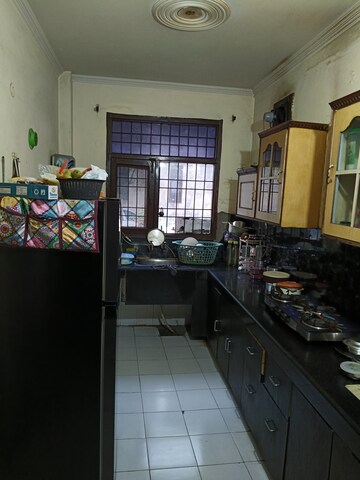 Kitchen in 3 BHK Builder Floor at Dhakoli Village – for Sale
