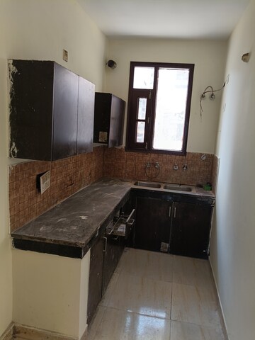 Kitchen in 2 BHK Builder Floor at Dhakoli Village – for Sale