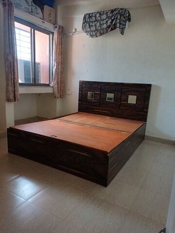 Bedroom in 1 BHK Apartment at Megh Malhar Co-op Housing Society, Ghansoli – for Rent