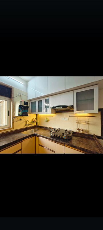 Kitchen in 2 BHK Apartment at Pride Presidency Luxuria, Ghodbunder Road – for Rent