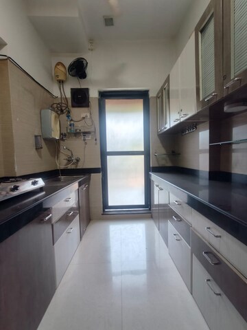 Kitchen in 2 BHK Apartment at K Raheja Interface Heights, Malad West – for Rent