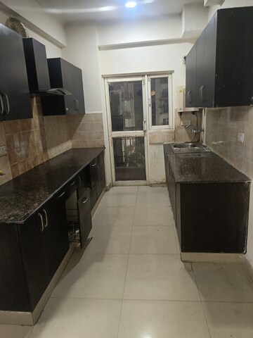 Kitchen in 2 BHK Apartment at Gardenia Golf City, Sector 75 – for Sale