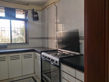 Kitchen in 3 BHK Apartment at Valencia Apartment Juhu, Juhu – for Rent