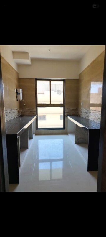 Kitchen in 2 BHK Apartment at Rajesh Raj Infinia, Malad West – for Rent
