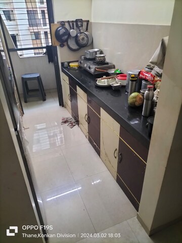 Kitchen in 1 BHK Apartment at Lodha Palava City Lakeshore Greens, Dombivli East – for Sale