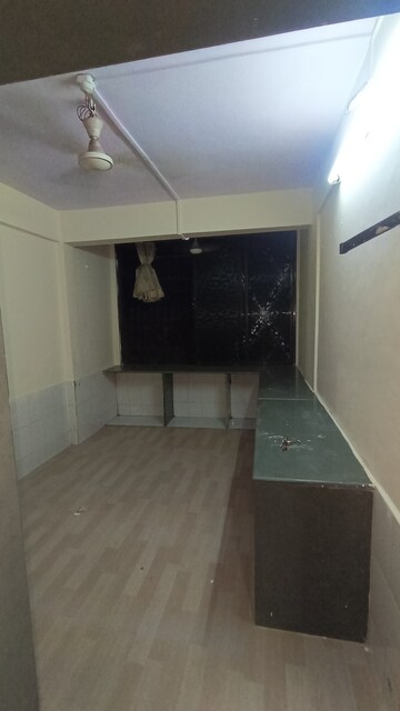 Kitchen in 1 BHK Apartment at Dak Sangathan CHS, Malad East – for Rent