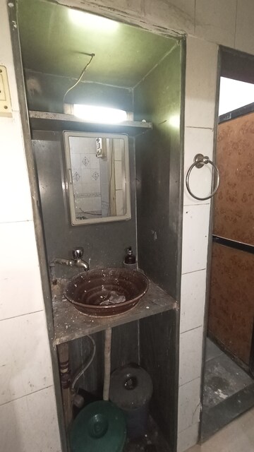 Kitchen in 1 BHK Apartment at Dak Sangathan CHS, Malad East – for Rent