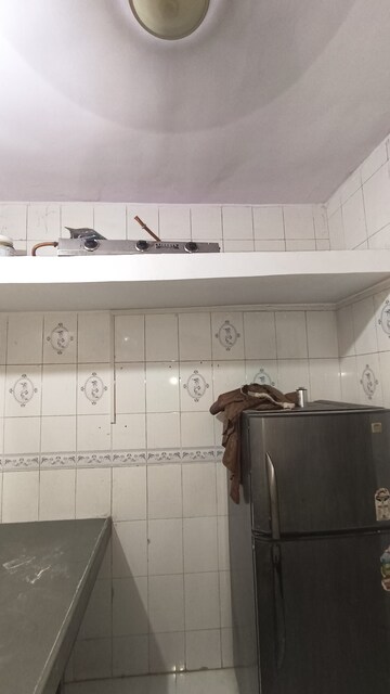 Kitchen in 1 BHK Apartment at Dak Sangathan CHS, Malad East – for Rent