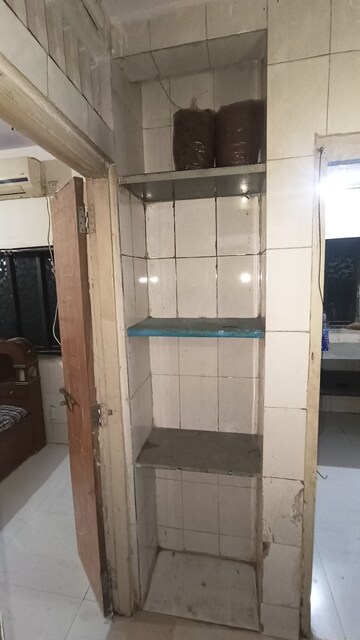 Bathroom in 1 BHK Apartment at Dak Sangathan CHS, Malad East – for Rent