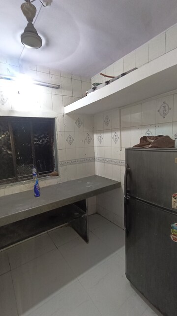 Kitchen in 1 BHK Apartment at Dak Sangathan CHS, Malad East – for Rent