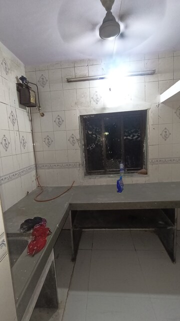 Kitchen in 1 BHK Apartment at Dak Sangathan CHS, Malad East – for Rent