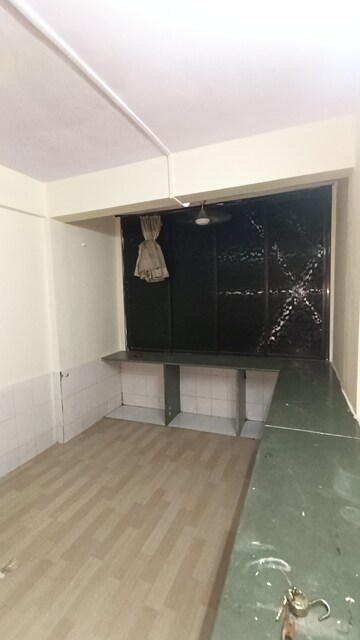 Kitchen in 1 BHK Apartment at Dak Sangathan CHS, Malad East – for Rent
