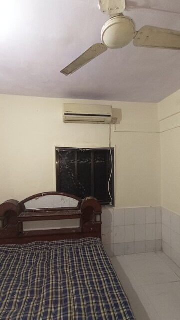 Living Room in 1 BHK Apartment at Dak Sangathan CHS, Malad East – for Rent