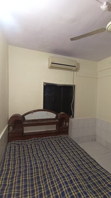 Bedroom in 1 BHK Apartment at Dak Sangathan CHS, Malad East – for Rent