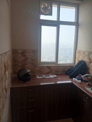 Kitchen in 2.5 BHK Apartment at Amrapali Golf Homes, Sector 4 Greater Noida – for Rent