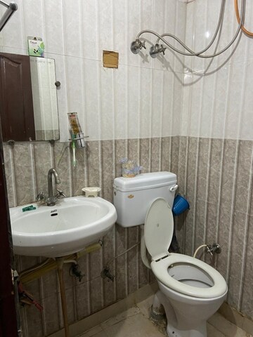 Bathroom in 2 BHK Builder Floor at Soho Apartments, Shakti Khand – for Sale