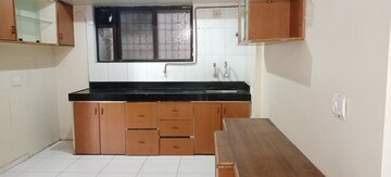 Kitchen in 2 BHK Apartment at Sunshree Gold, Nibm Road – for Rent