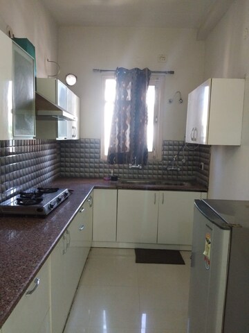 Kitchen in 2 BHK Apartment at Jaipurias Sunrise Greens Zirakpur, Vip Road – for Rent