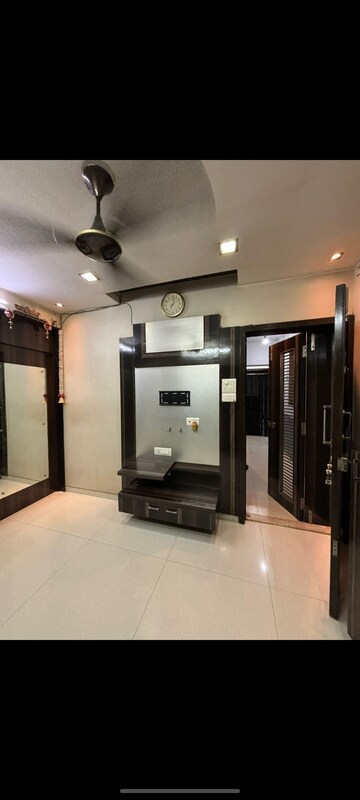 Living Room in 1 BHK Apartment at Laxmi Bhavan Borivalli, Borivali West – for Sale