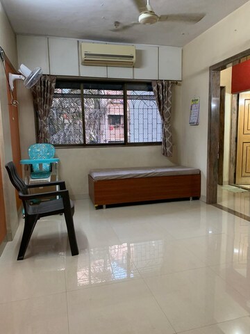 Living Room in 1 BHK Apartment at Laxmi Krupa Apartment, Borivali West – for Rent