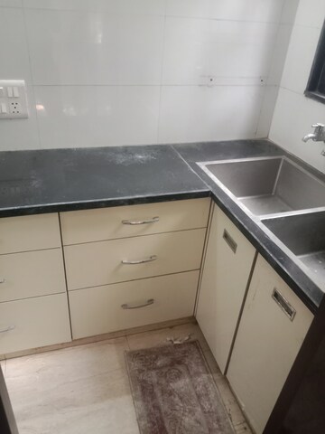 Kitchen in 2 BHK Apartment at Rohini Sector 18 – for Rent