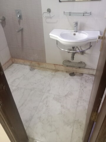 Bathroom in 2 BHK Apartment at Rohini Sector 18 – for Rent