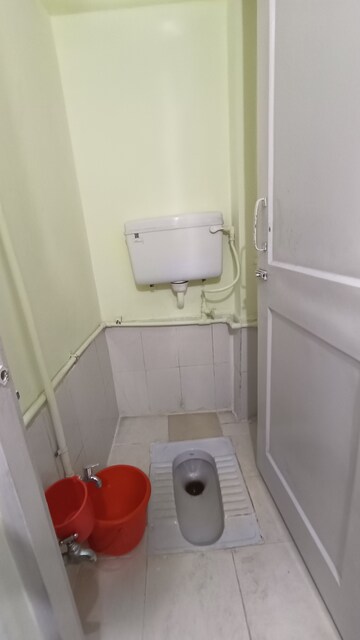 Bathroom in 1 BHK Apartment at Sunrise CHS Mhada, Goregaon East – for Rent
