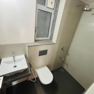 Bathroom in 2 BHK Apartment at Piramal Vaikunth Vama, Ashok Nagar – for Rent