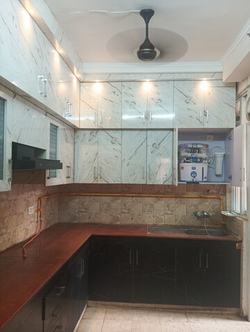 Kitchen in 3 BHK Apartment at Amrapali Golf Homes, Sector 4, Greater Noida – for Rent