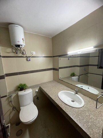 Bathroom in 3 BHK Apartment at Unitech Uniworld Gardens 2, Sector 47 – for Rent