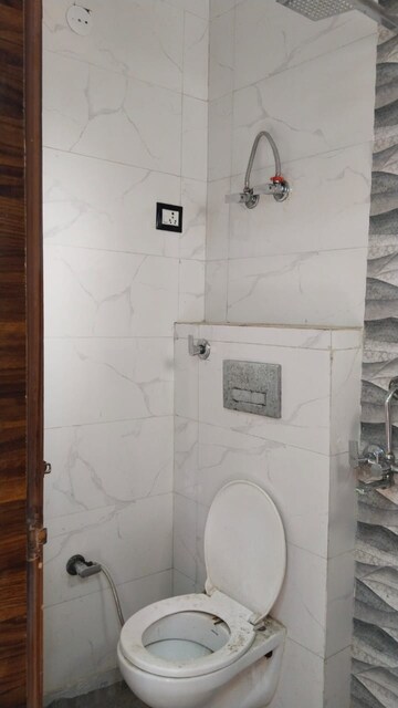 Bathroom in 2 BHK Builder Floor at Dwarka Mor – for Rent
