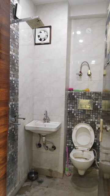 Bathroom in 2 BHK Builder Floor at Dwarka Mor – for Rent