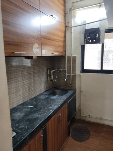 Kitchen in 1.5 BHK Apartment at Sahyadri Niwas CHS, Sanpada – for Rent