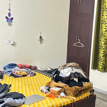 Bedroom in 2 BHK Builder Floor at RWA Apartments Sector 26, Arun Vihar – for Rent