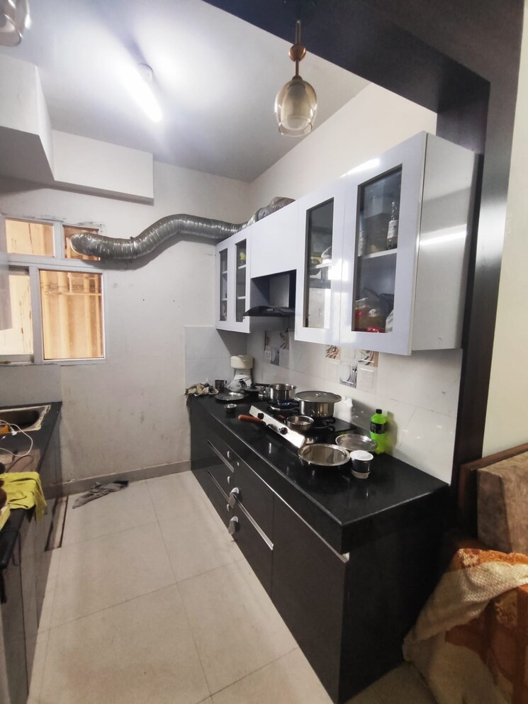 Kitchen, signature-global-the-roselia 2 Bedroom 800 Sq.Ft. Apartment In Sector 95a Gurgaon 8153609