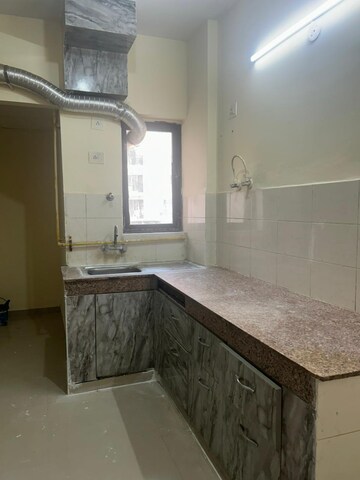 Kitchen in 3 BHK Apartment at Logix Blossom County, Sector 137 – for Rent