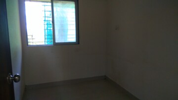 Room in 2 BHK Apartment at Neptune CHS Andheri West, Andheri West – for Sale