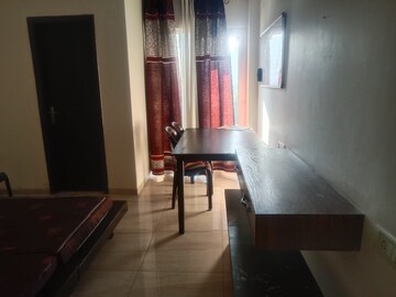 Living Room in 2 BHK Apartment at Logix Blossom County, Sector 137 – for Rent