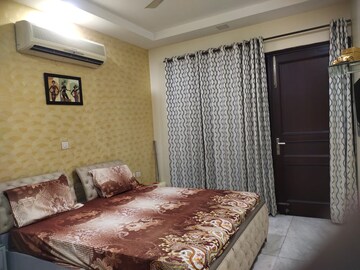 Bedroom in 4 BHK Builder Floor at Rajouri Garden – for Sale