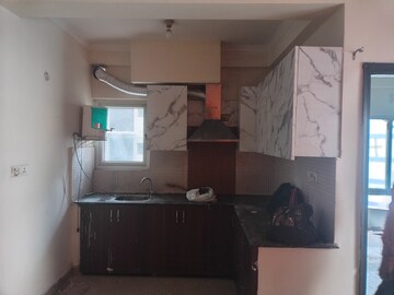 Kitchen in 1 BHK Apartment at Nimbus The Hyde park, Sector 78 – for Rent