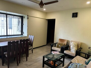 Living Room in 2 BHK Apartment at Satellite Garden, Goregaon East – for Rent